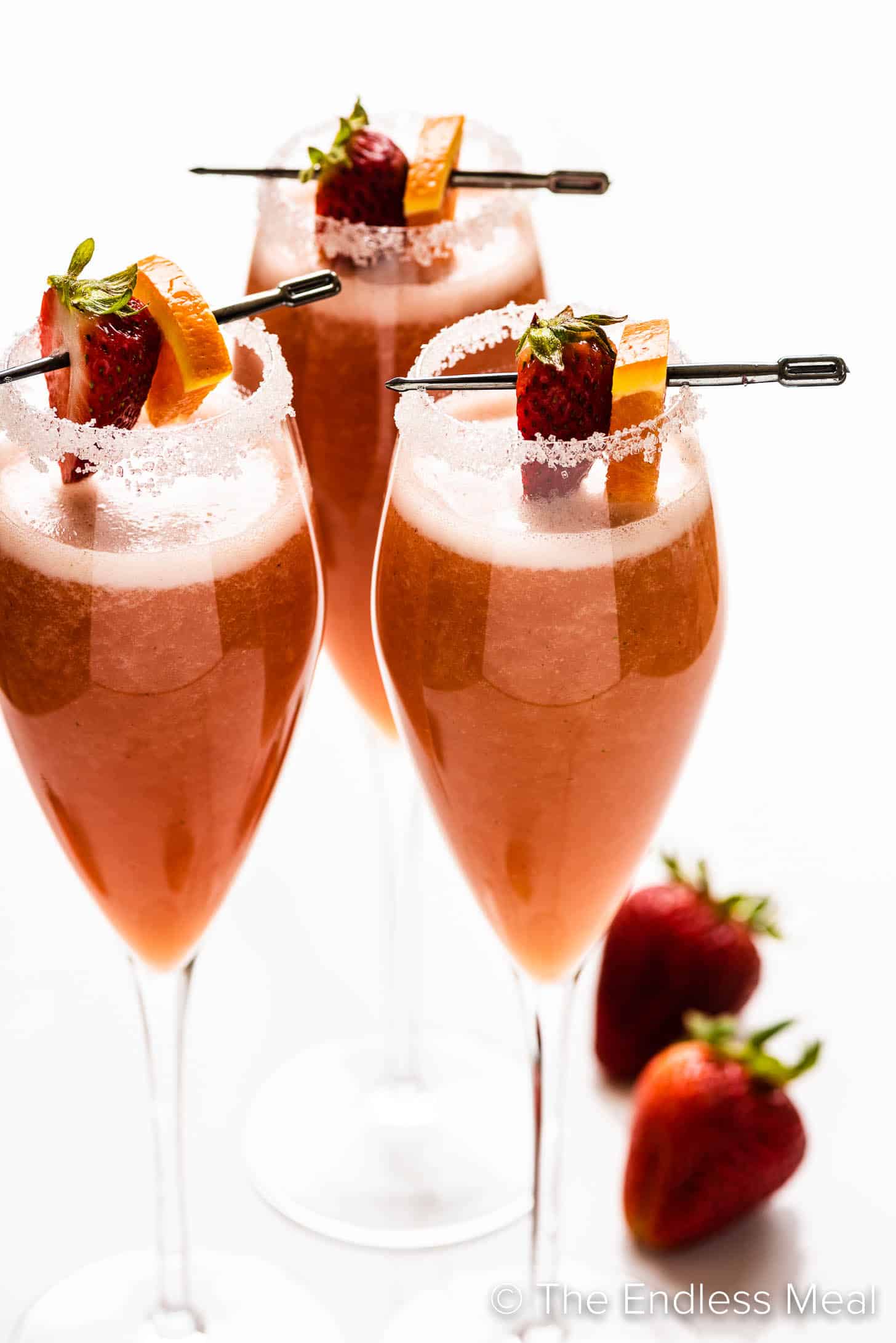 strawberry orange mimosa in flute glasses
