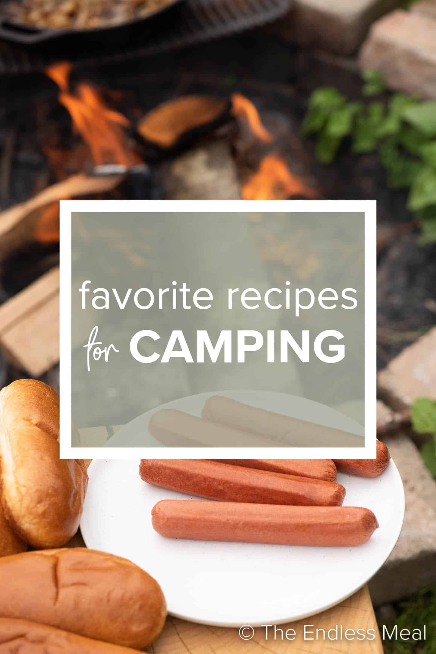 a picture of a campfire and hot dogs with the words Camping Recipes written on top.