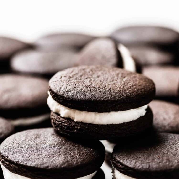 a stack of homemade Oreo cookies on a plate