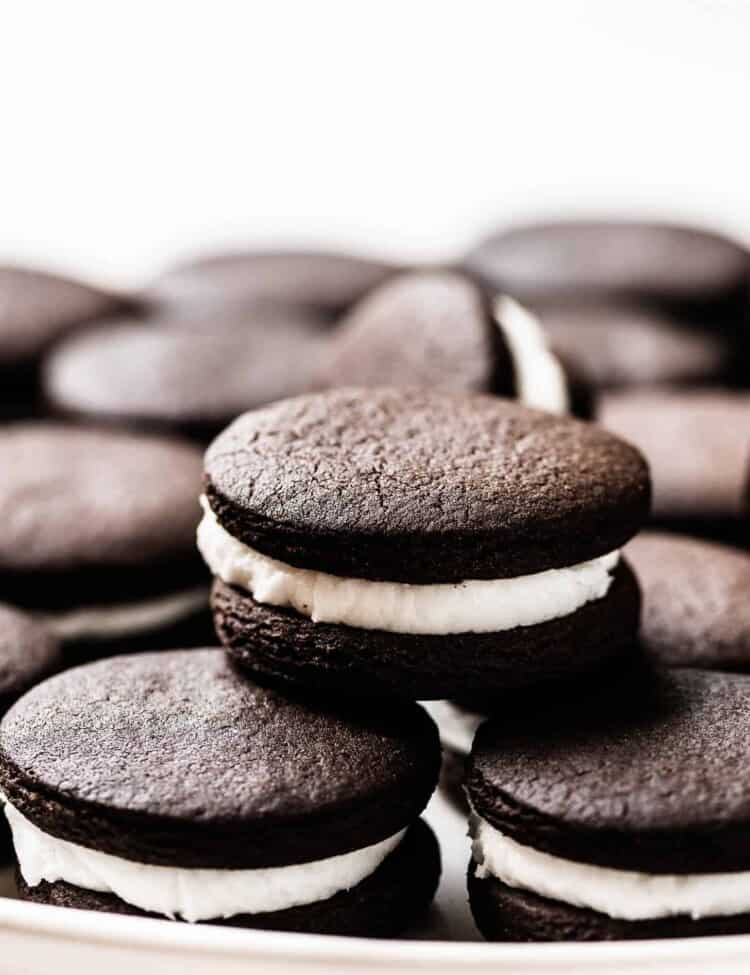 a stack of homemade Oreo cookies on a plate