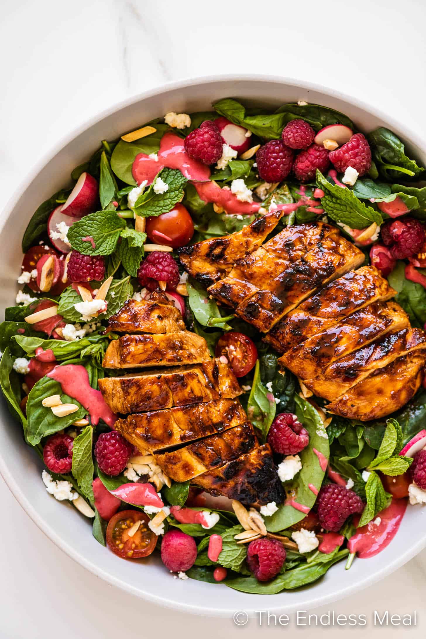 Summer Chicken Salad with Raspberries in a salad bowl