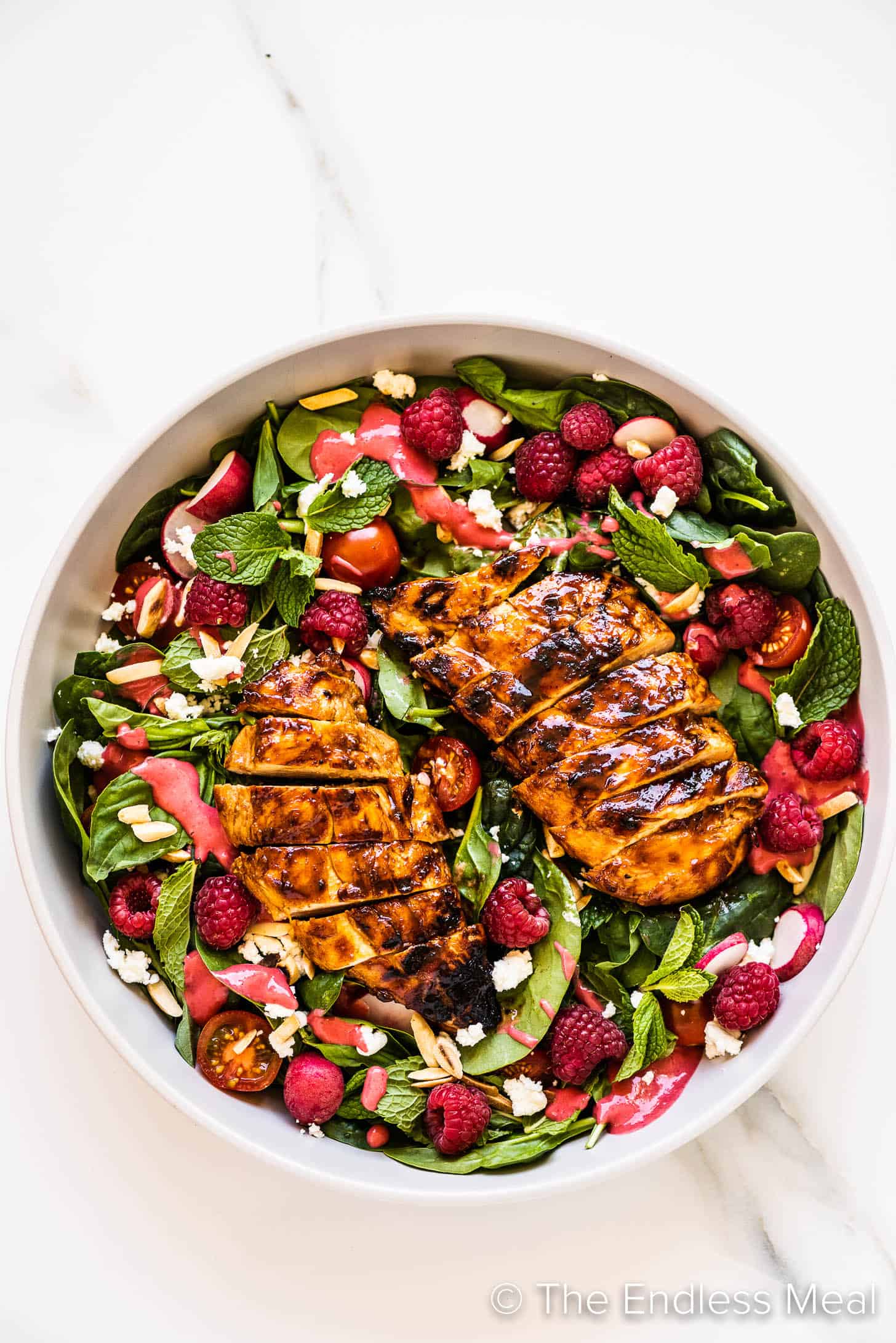 Summer Chicken Salad with spinach and raspberries