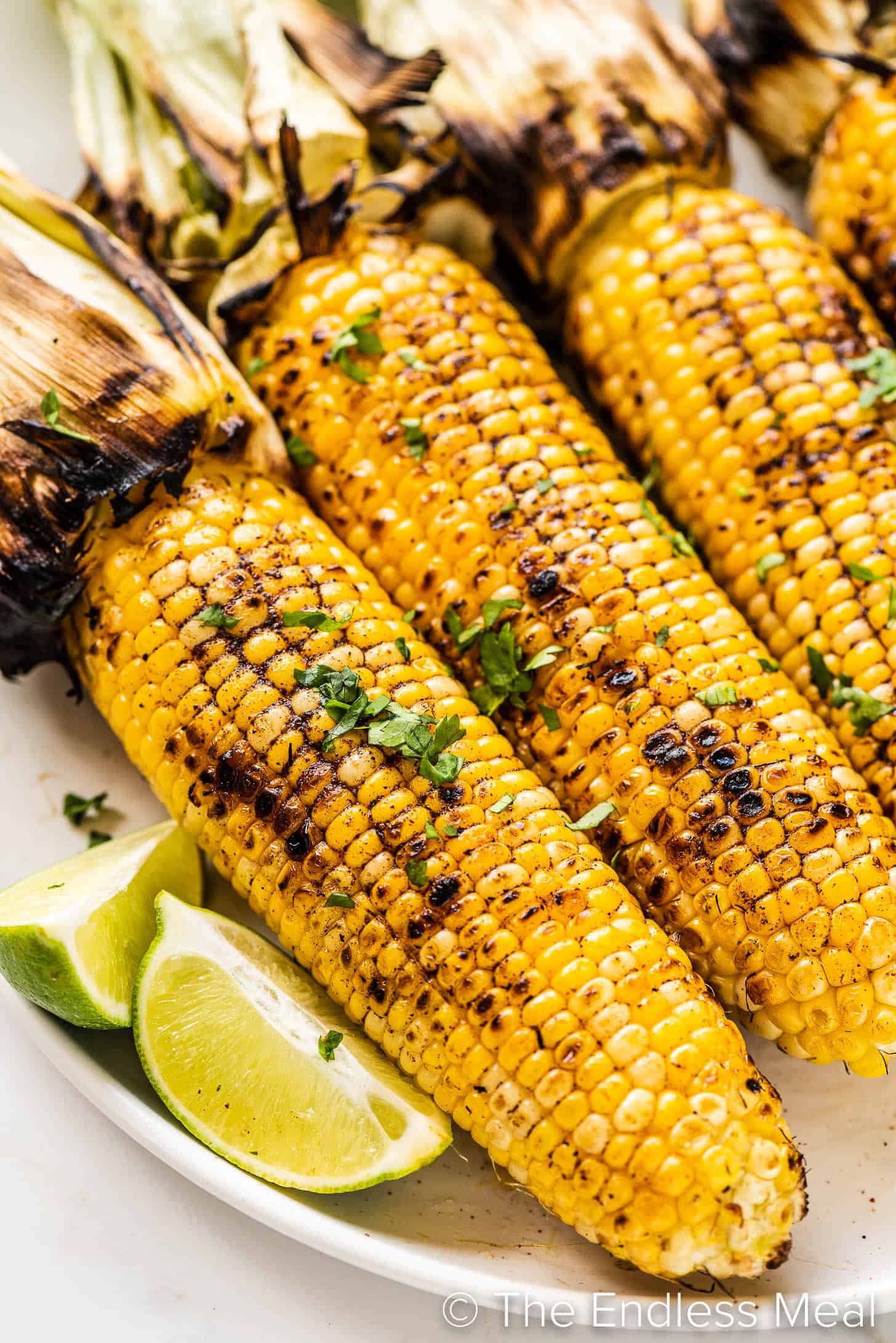 a close up of Grilled Corn on the Cob with Chili Lime Butter