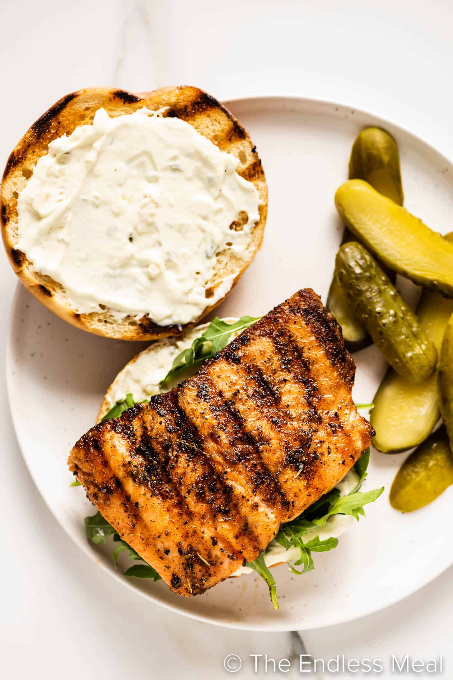 a Grilled Salmon Sandwich on a plate