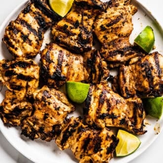 chicken thighs marinated in jerk marinade on a plate