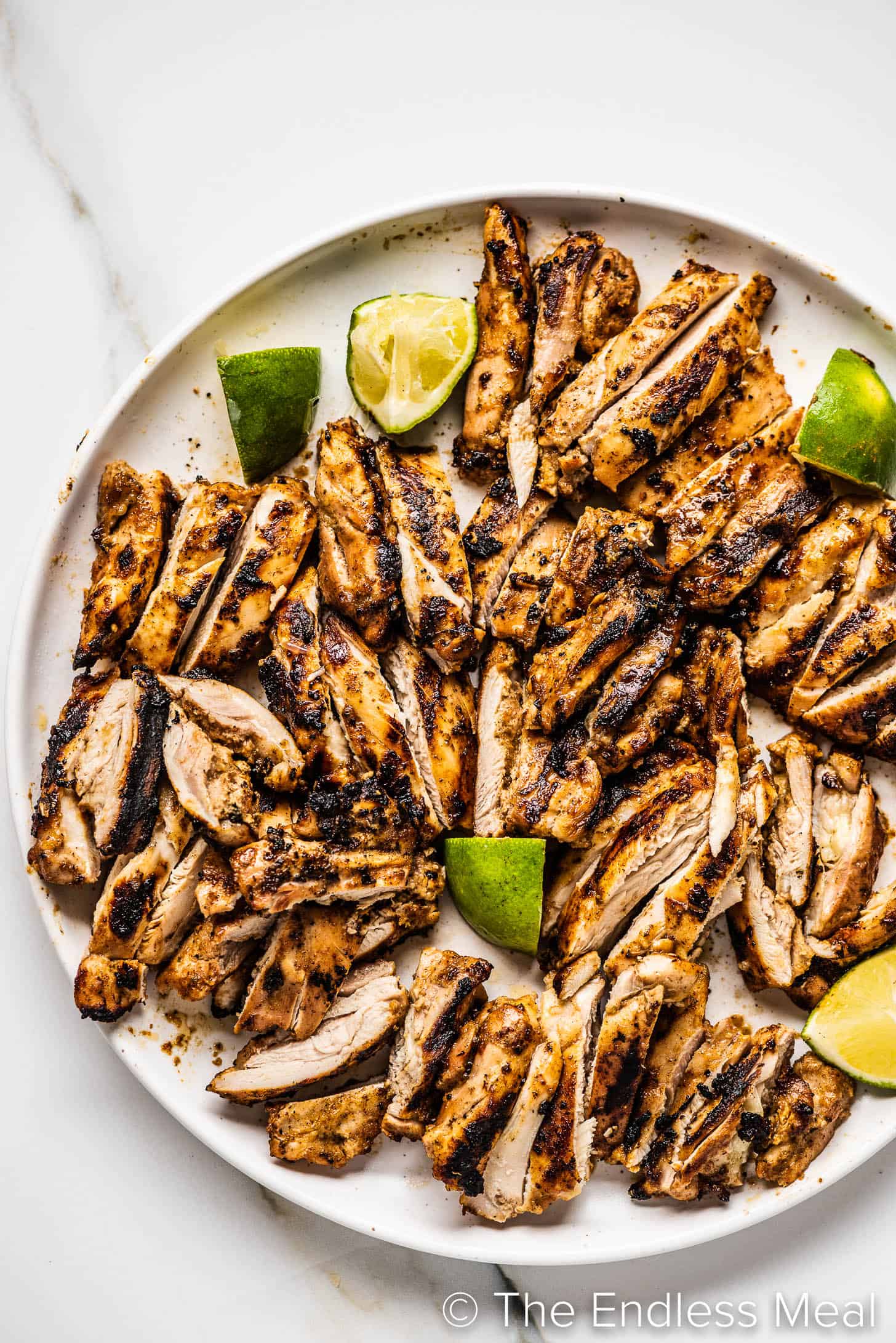 jerk chicken sliced on a plate ready for tacos