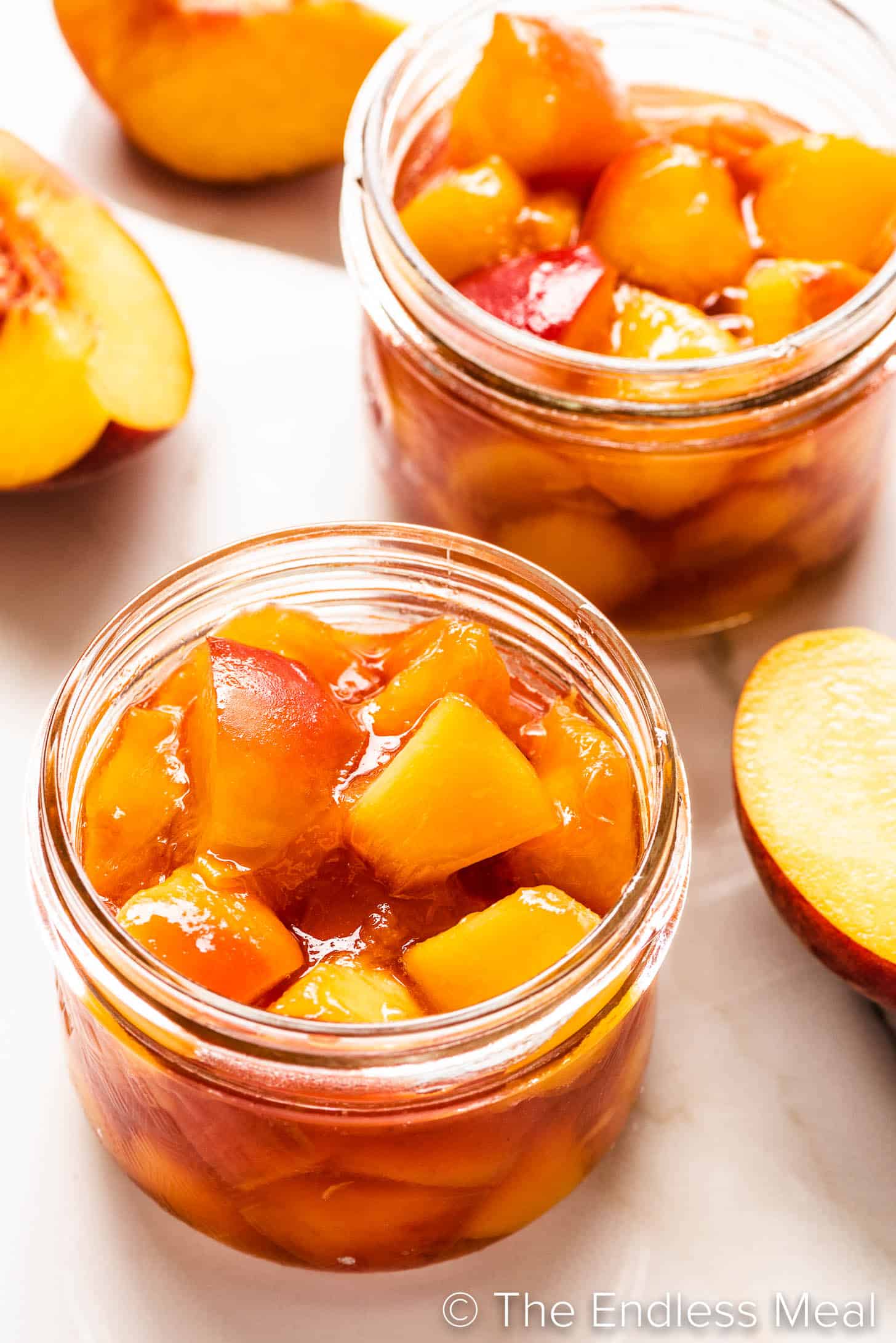 2 cans of peaches cooked in maple syrup
