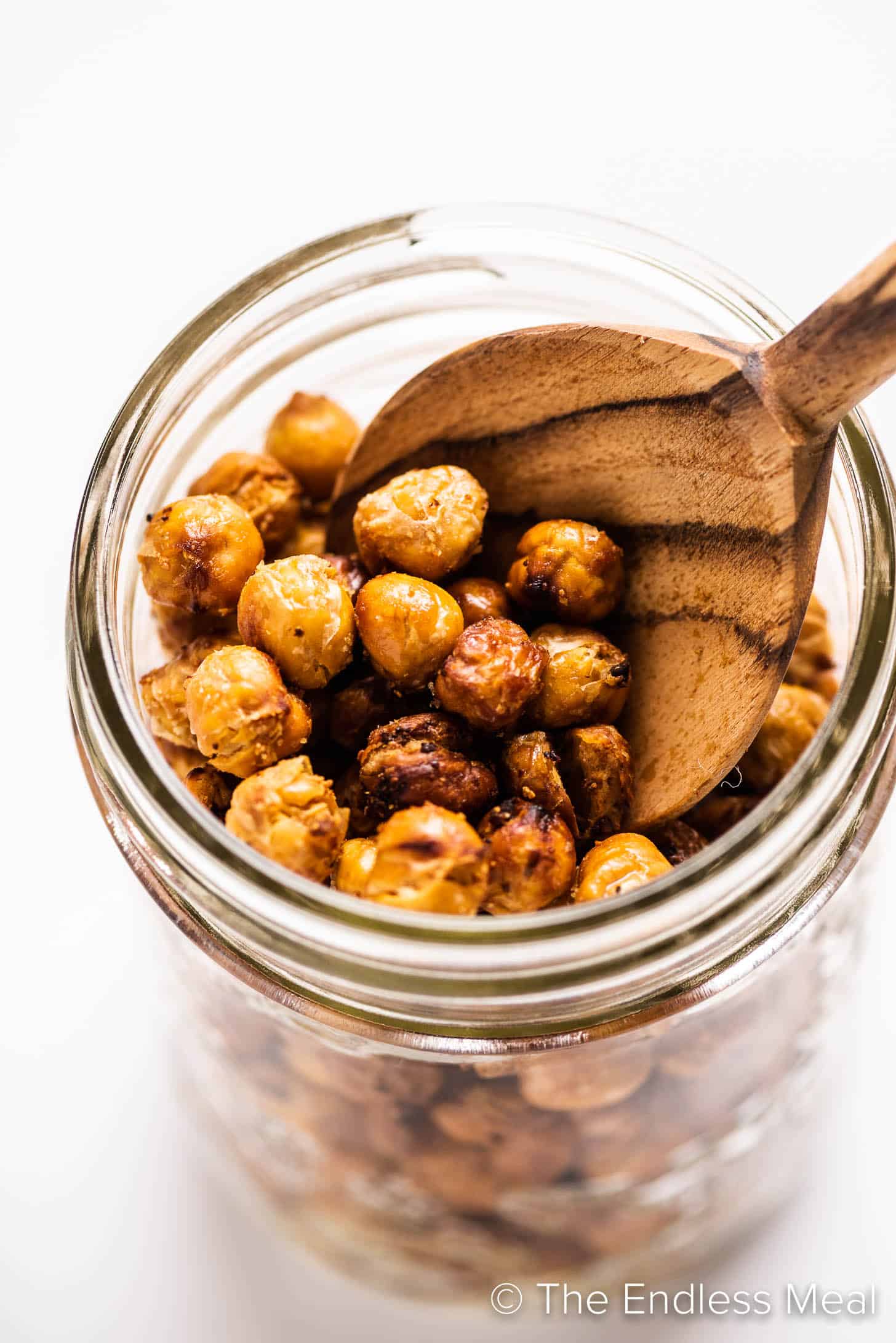 Roasted Chickpeas in a jar with a spoon