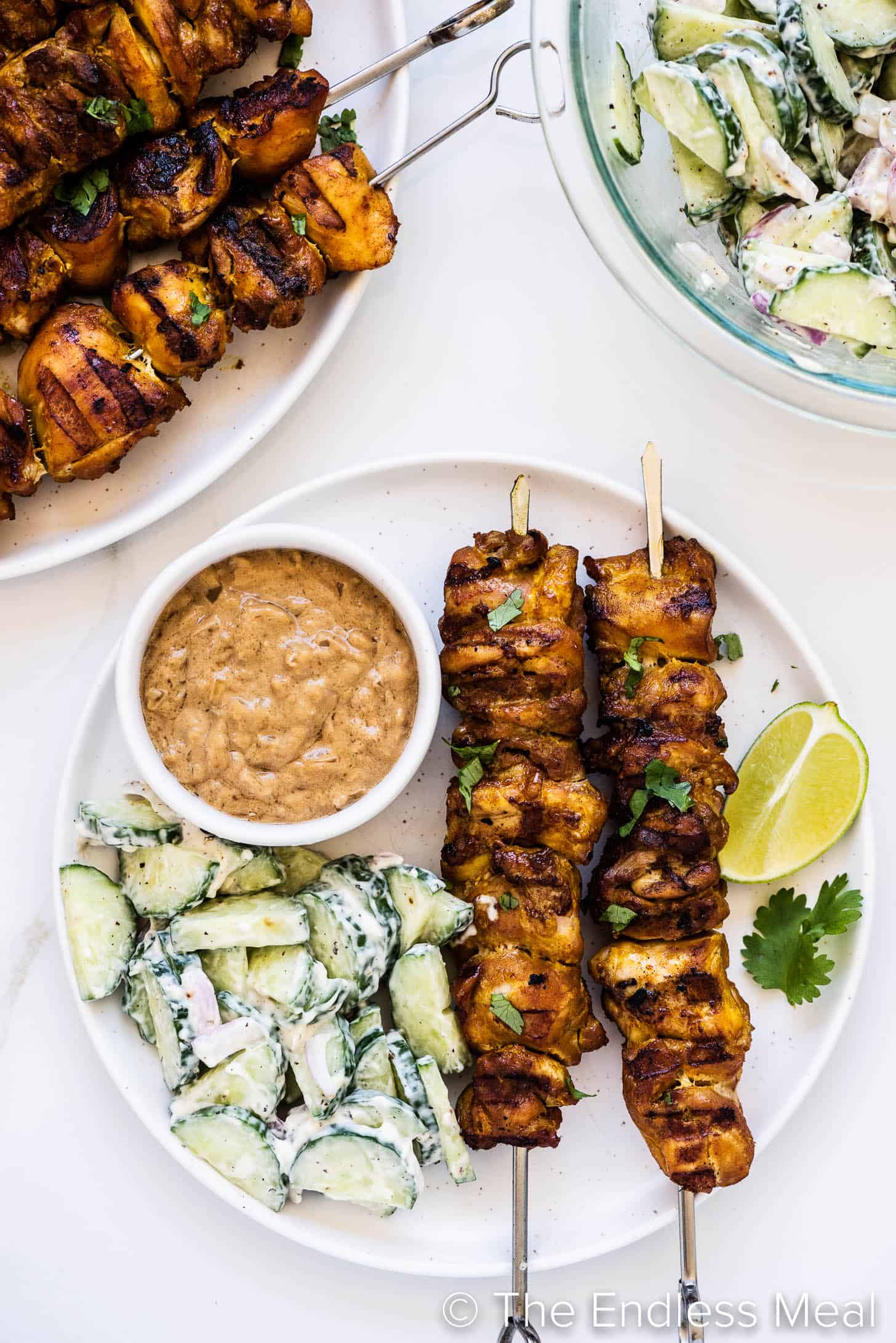 Thai Chicken Skewers with peanut satay sauce and cucumber salad