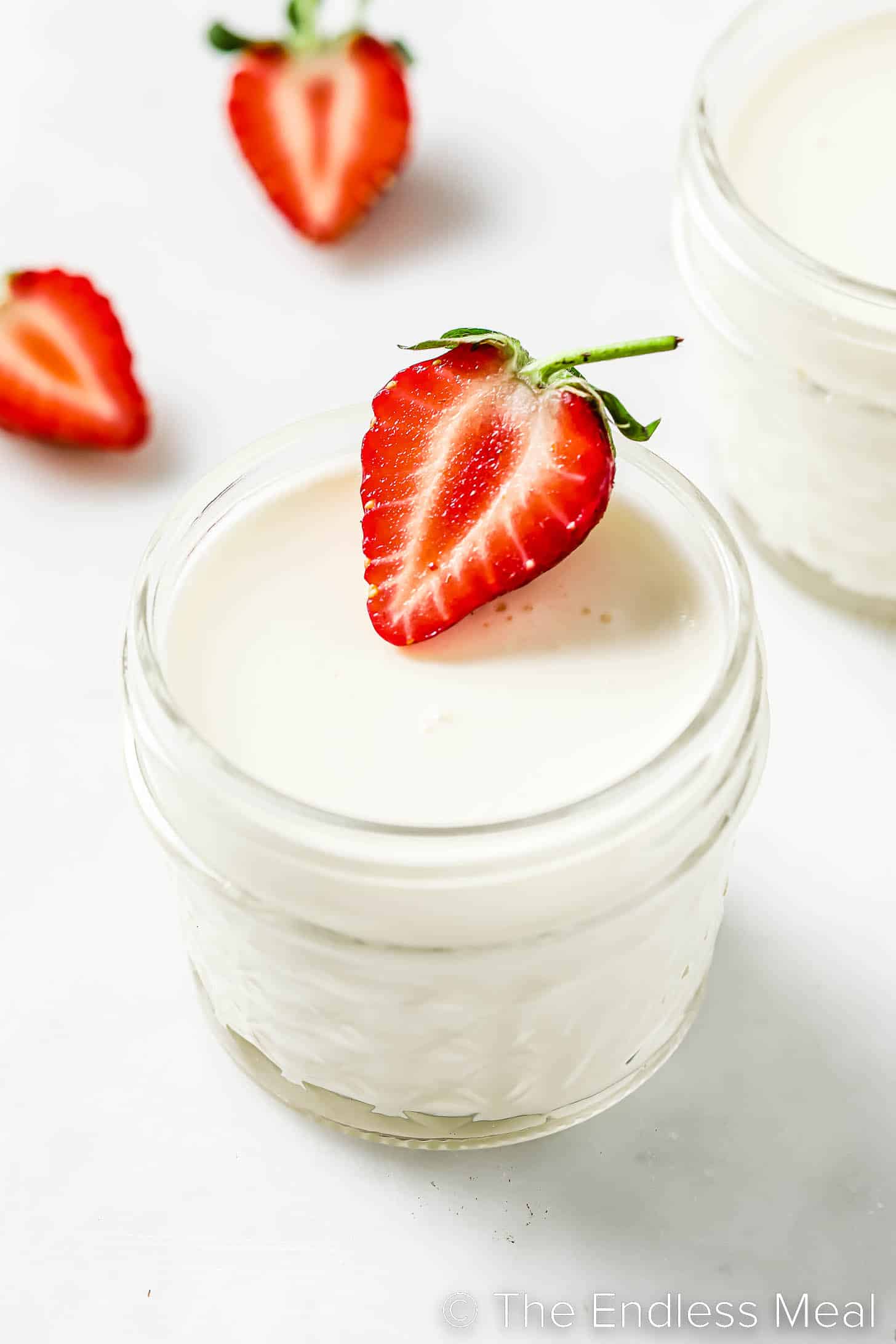 Buttermilk Panna Cotta topped with a strawberry