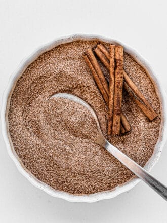 a spoon in a bowl of Cinnamon Sugar