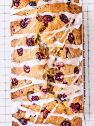 looking down on a loaf of glazed Cranberry Banana Bread