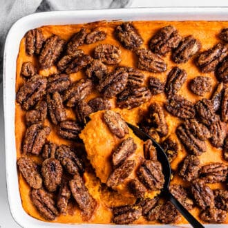 Easy Sweet Potato Casserole with candied pecans in a casserole dish