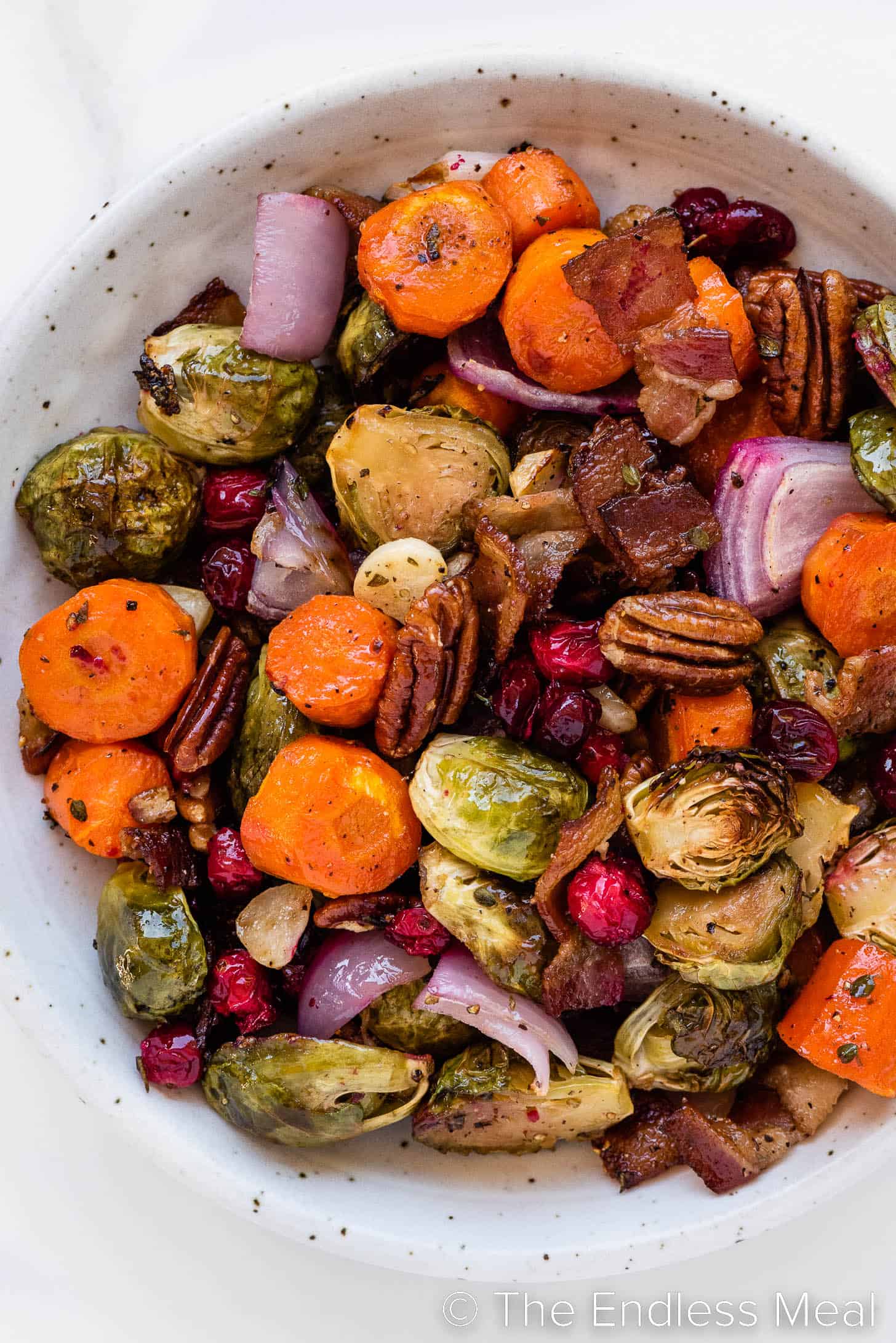 A closeup of Holiday Roasted Vegetables in a serving bowl