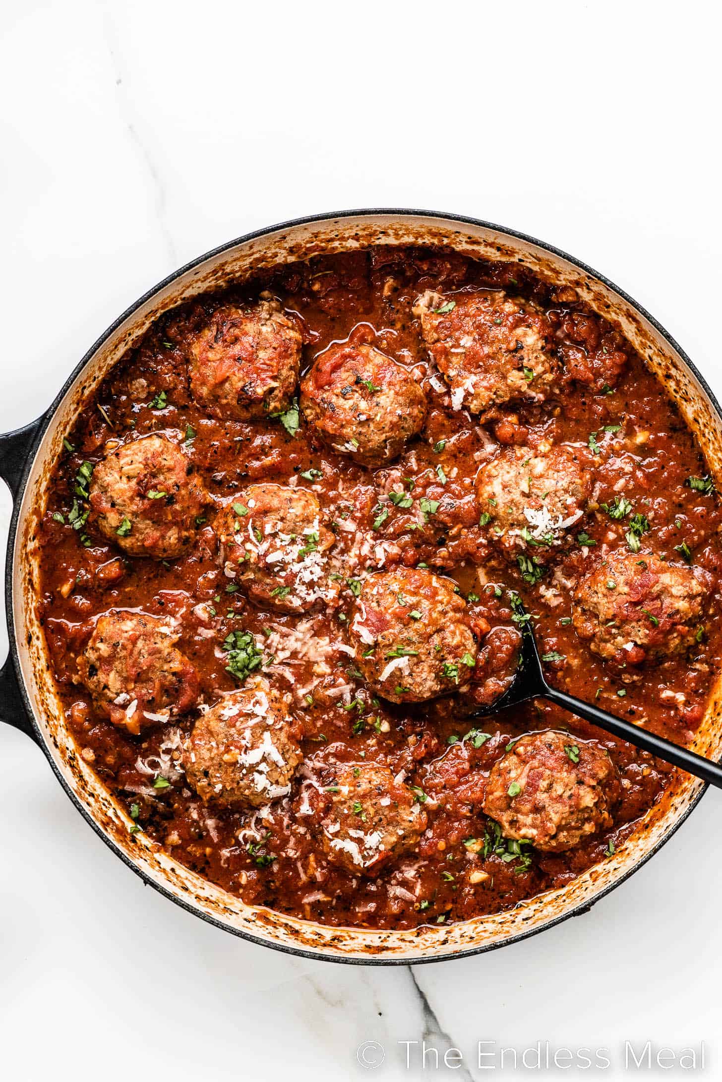 Meatballs in Tomato Sauce cooking in a pot