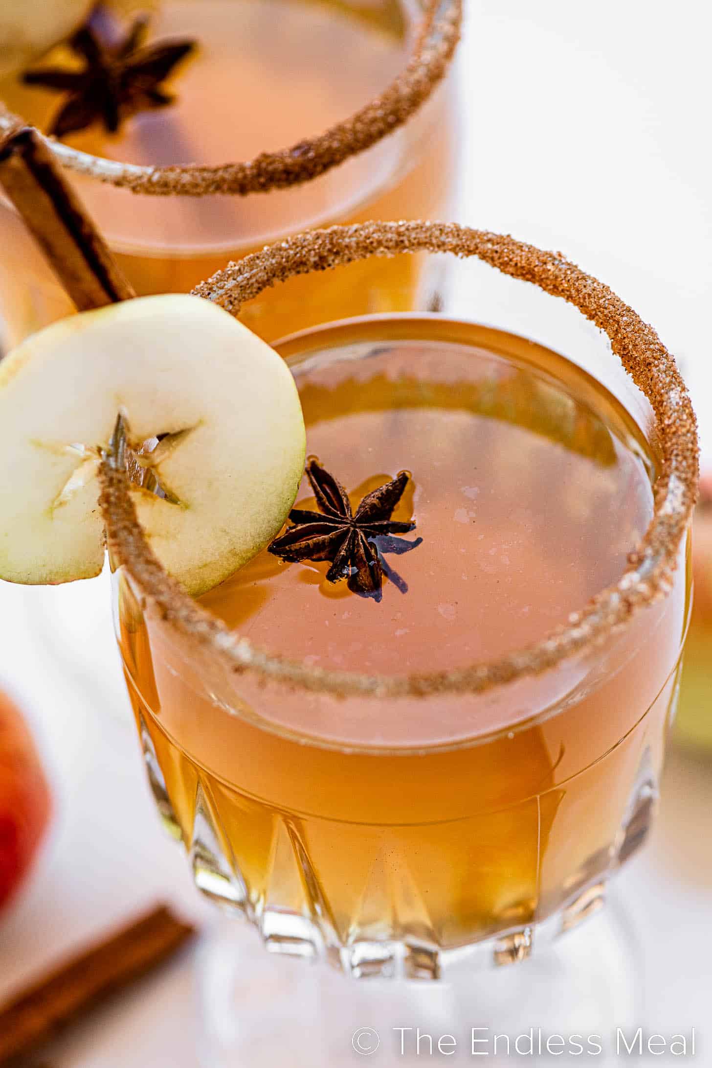 a close up of a glass of Spiked Apple Cider