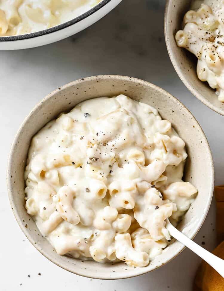 Four Cheese Mac and Cheese in a bowl with a spoon