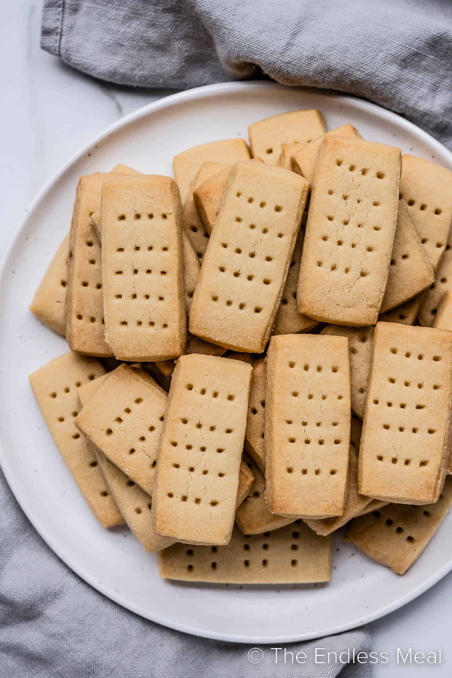Scottish Shortbread Cookies piled high on a plate