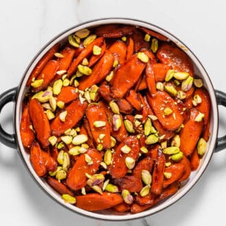 Bourbon glazed carrots in a serving dish