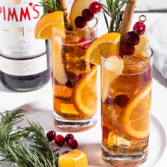 Winter Pimm's in glasses with lots of garnishes