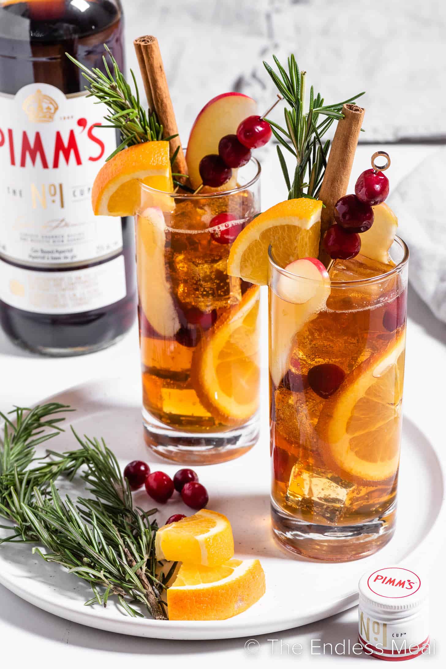 Winter Pimm's in glasses with lots of garnishes