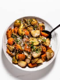 Roast Carrots Onions and Potatoes in a serving bowl