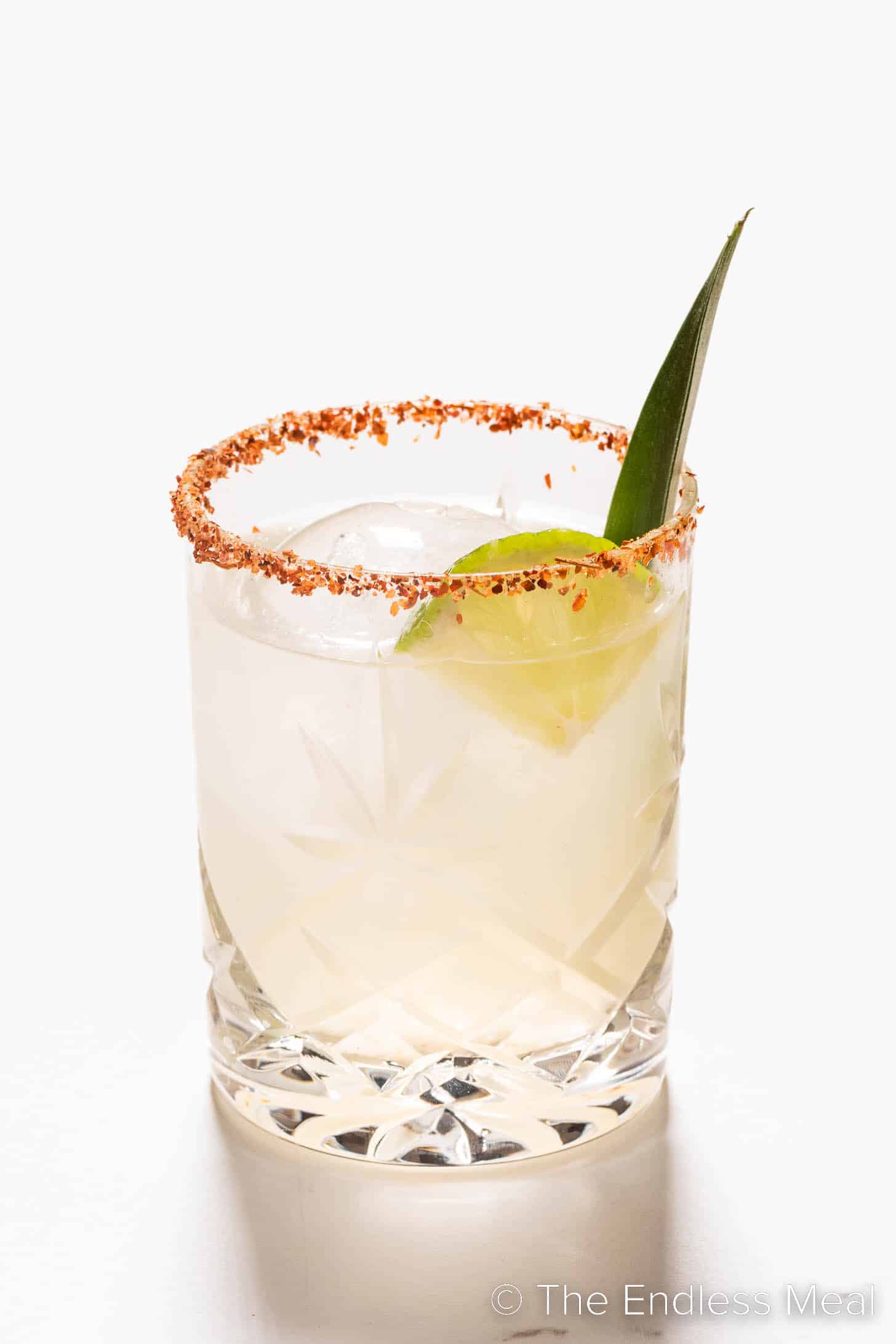 A Mezcal Margarita in a rocks glass.
