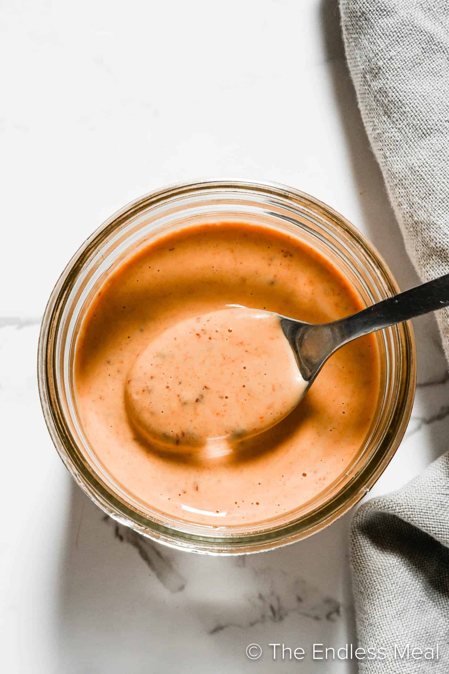 Chipotle Mayo in a jar with a spoon