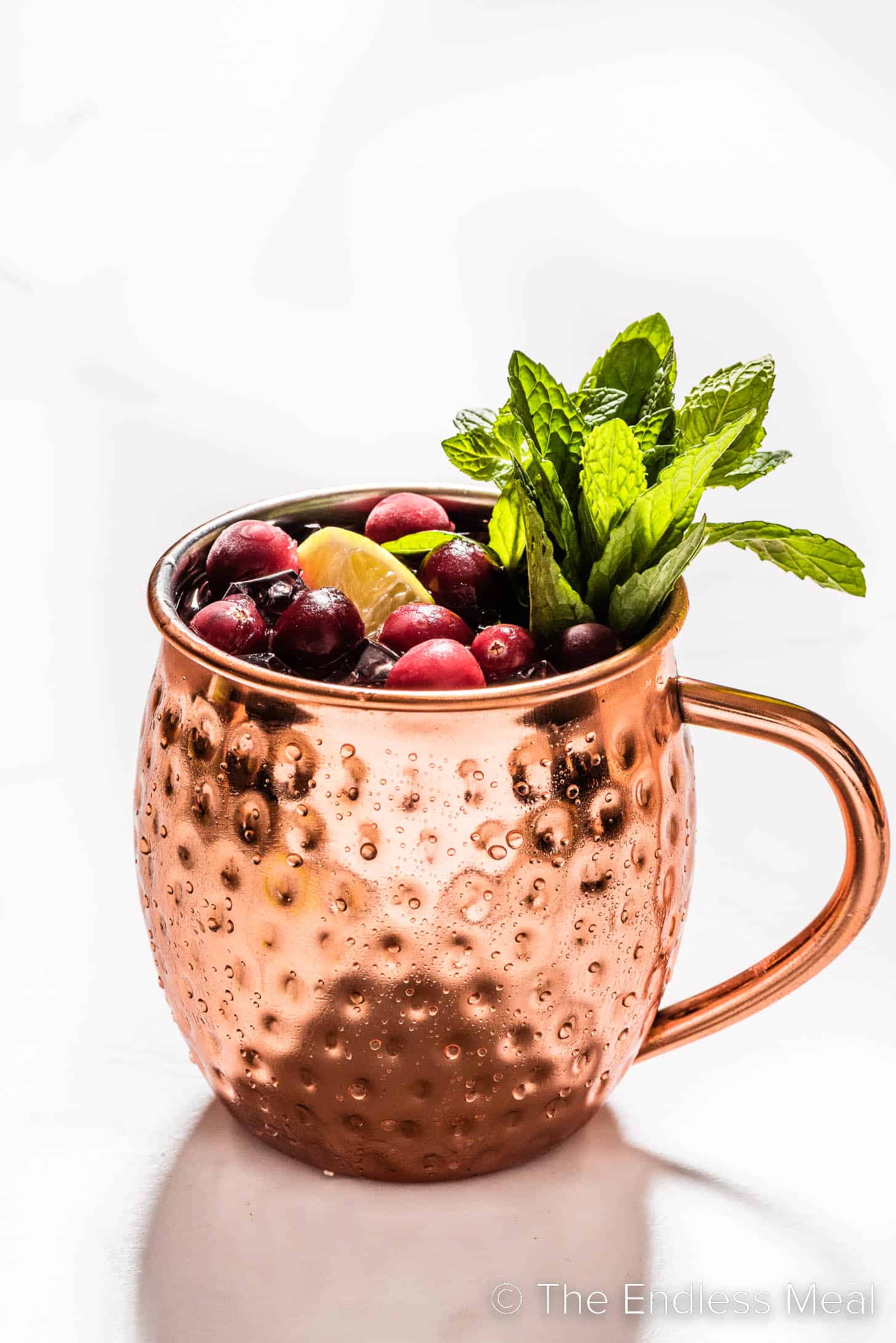 a Cranberry Moscow Mule in a copper mug