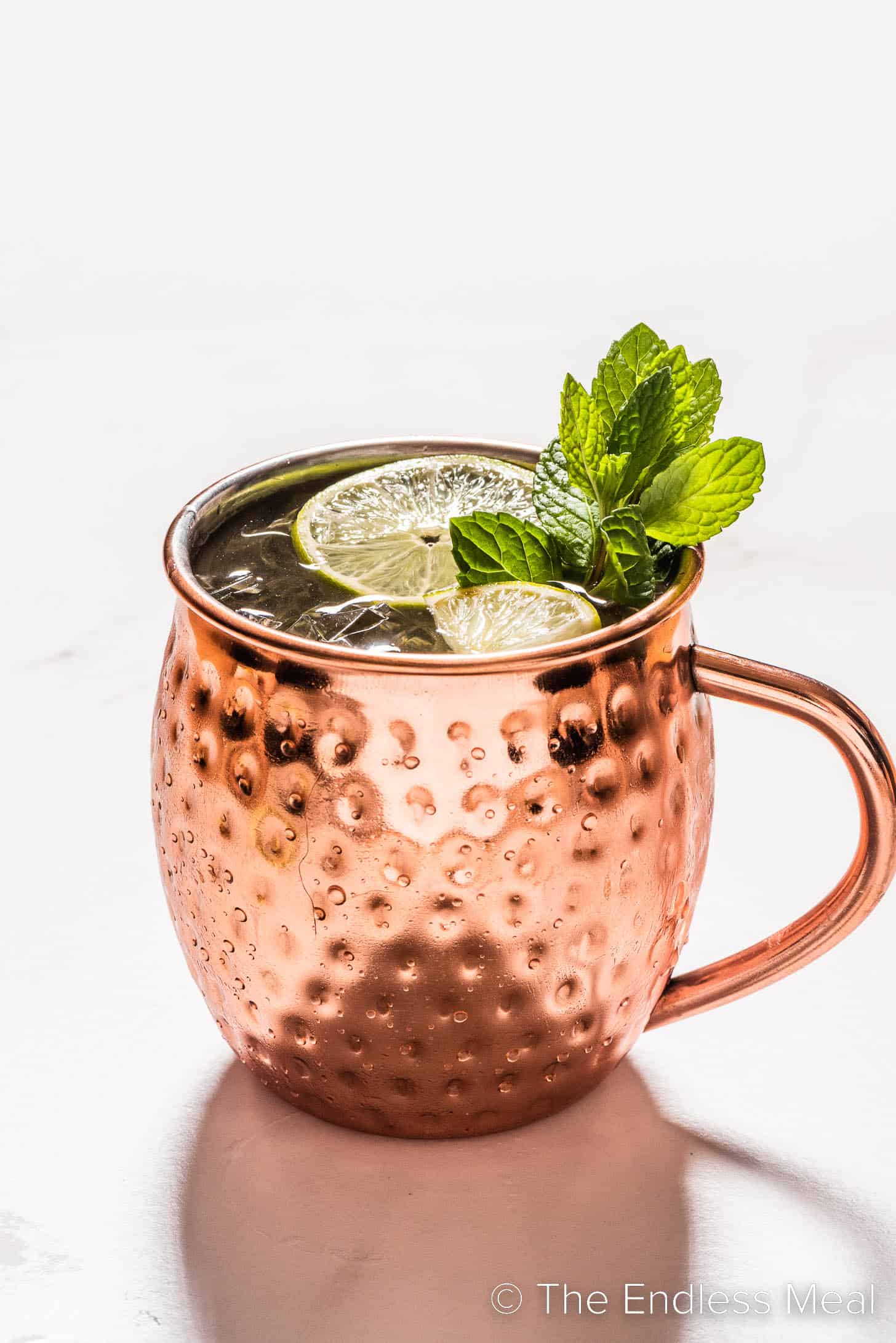 A Mezcal Mule with lime and mint