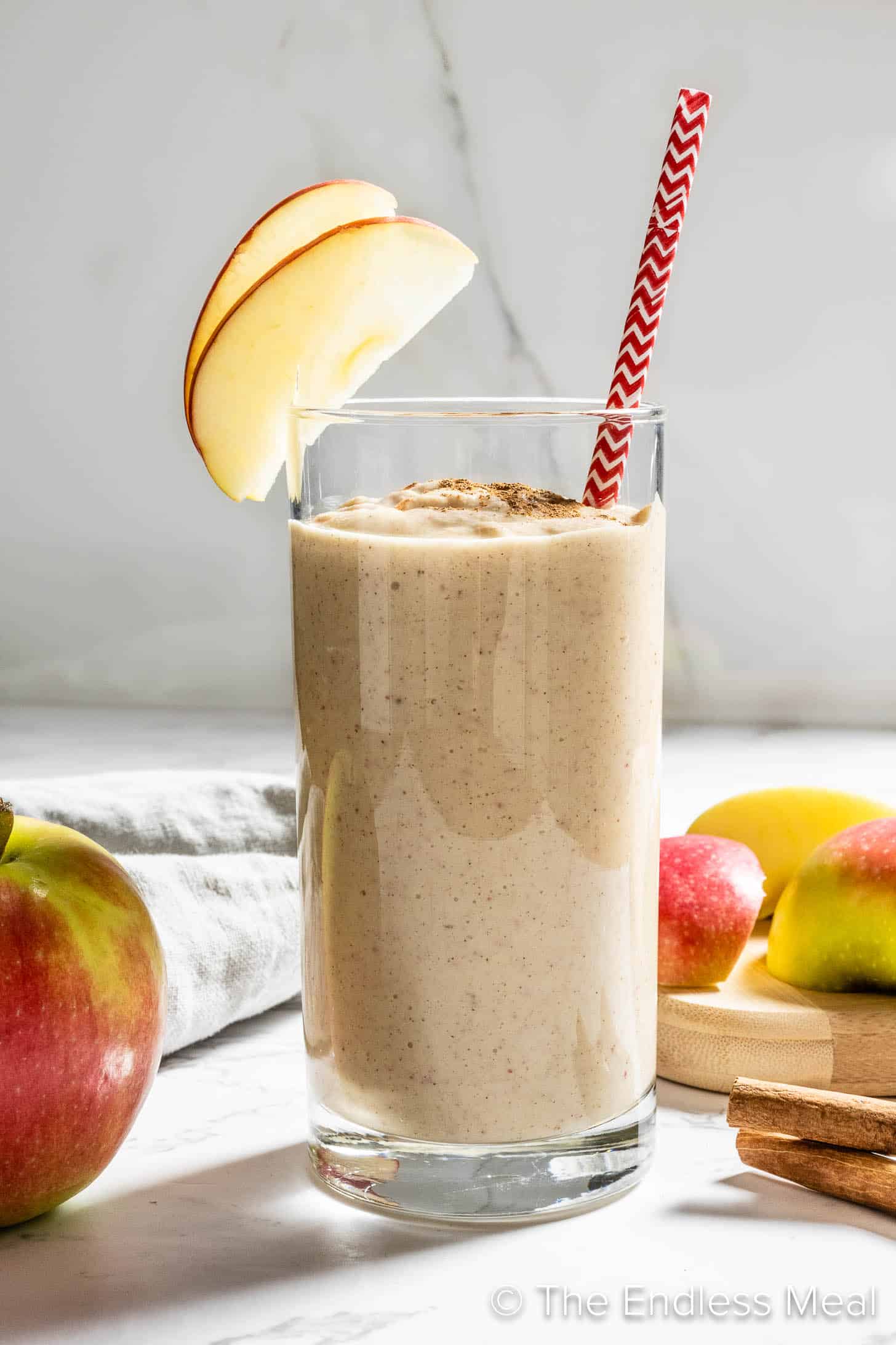 An Apple Smoothie in a tall glass