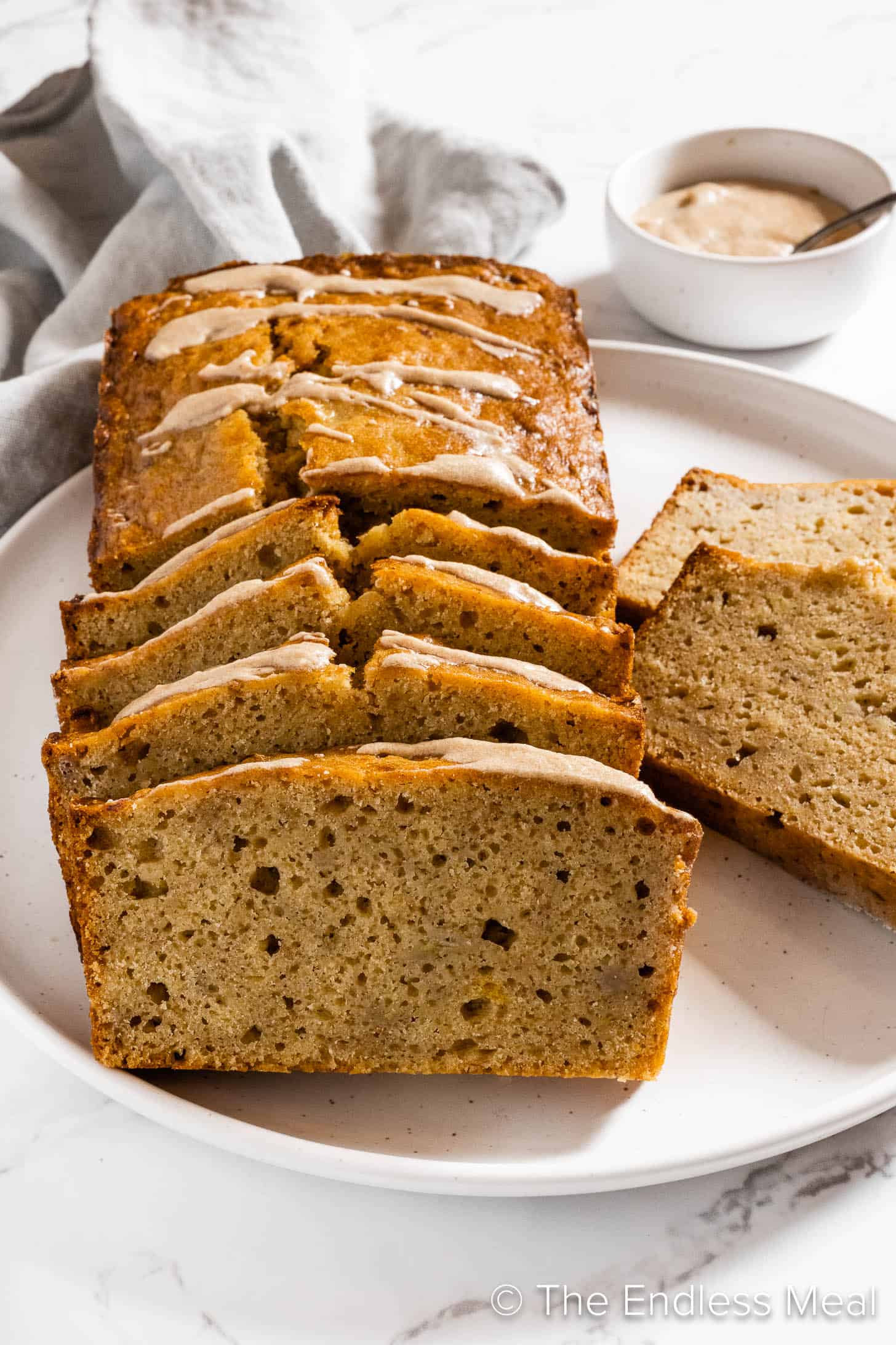 Slices of Brown Butter Banana Bread on a plate.