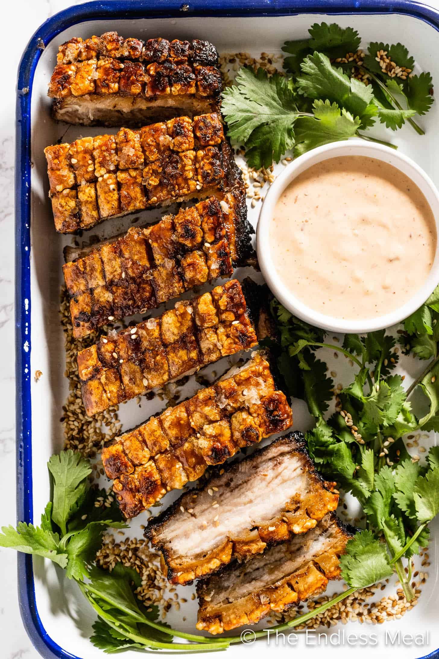 Looking down on Maple Glazed Pork Belly on a serving platter.