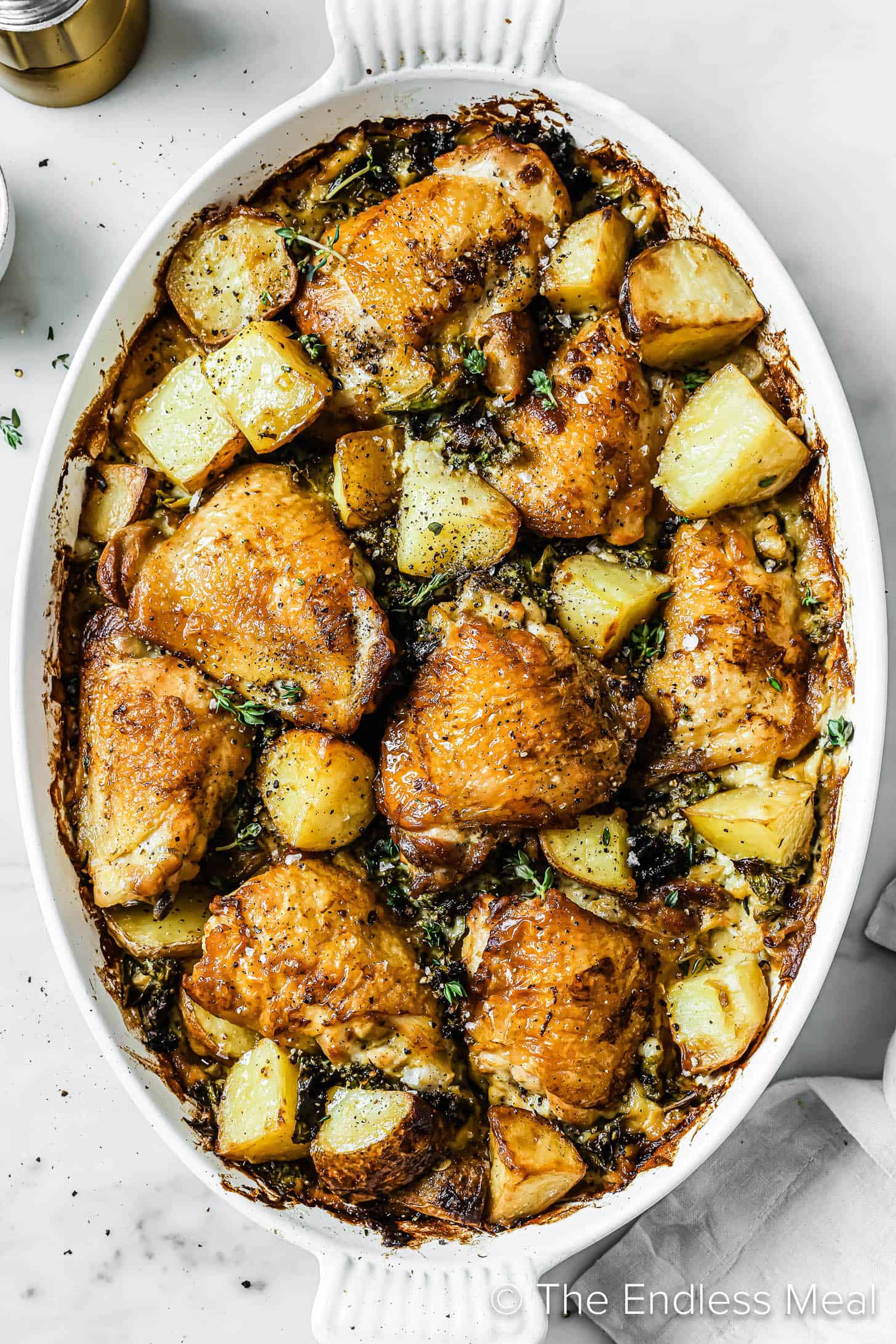 Looking down at au Gratin Potatoes and Chicken in a baking dish