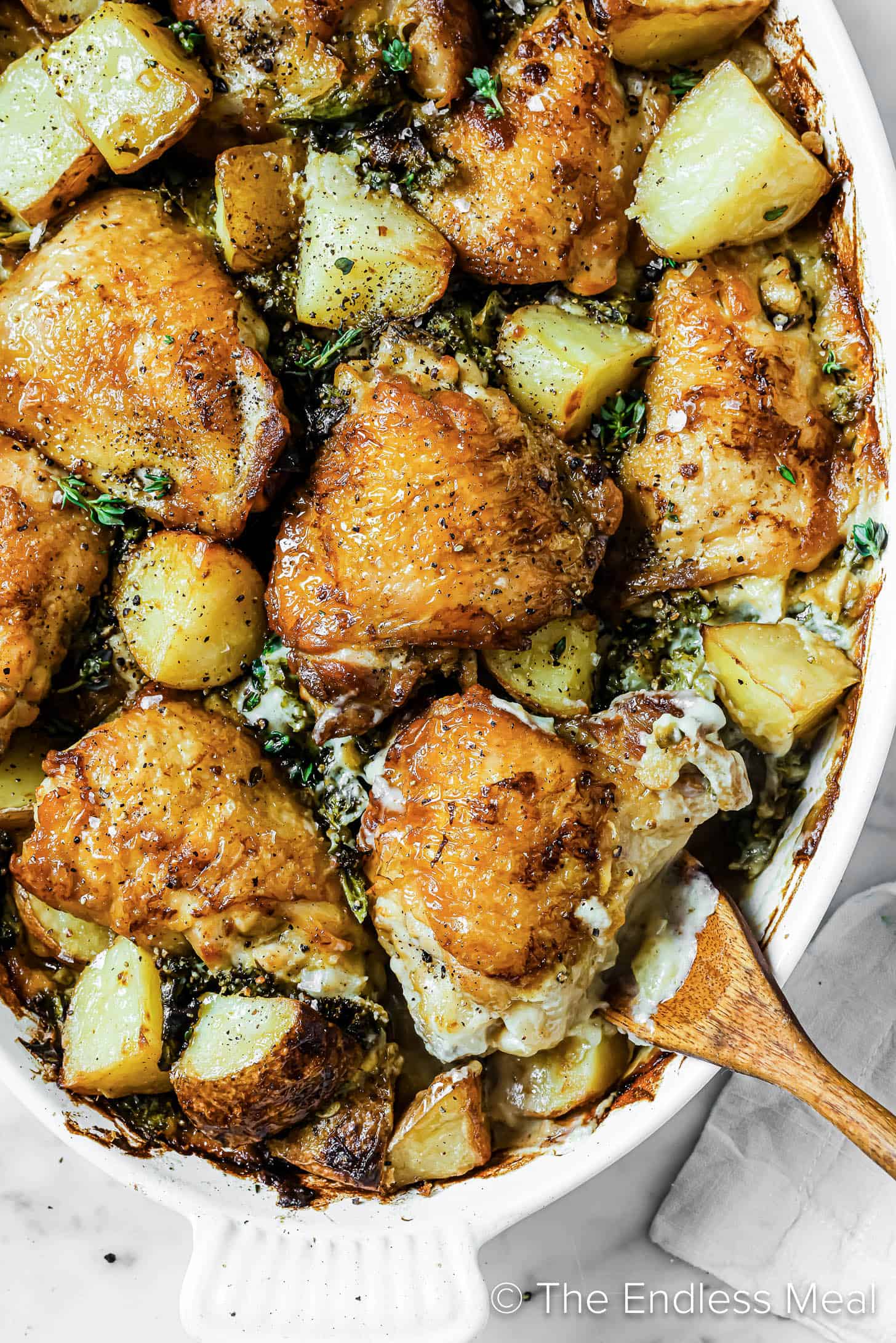 A close up of Chicken with au Gratin Potatoes in a baking dish