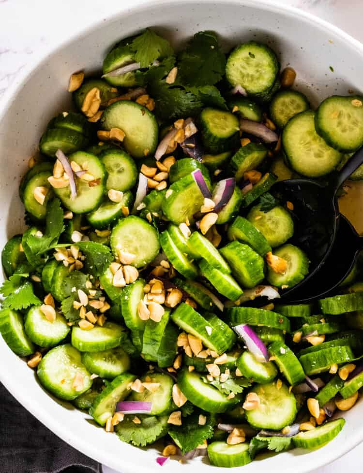 A close up of Thai Cucumber Salad in a serving bowl