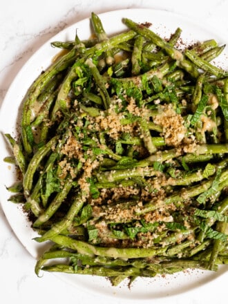 a close up of Green Beans with Tahini on a plate