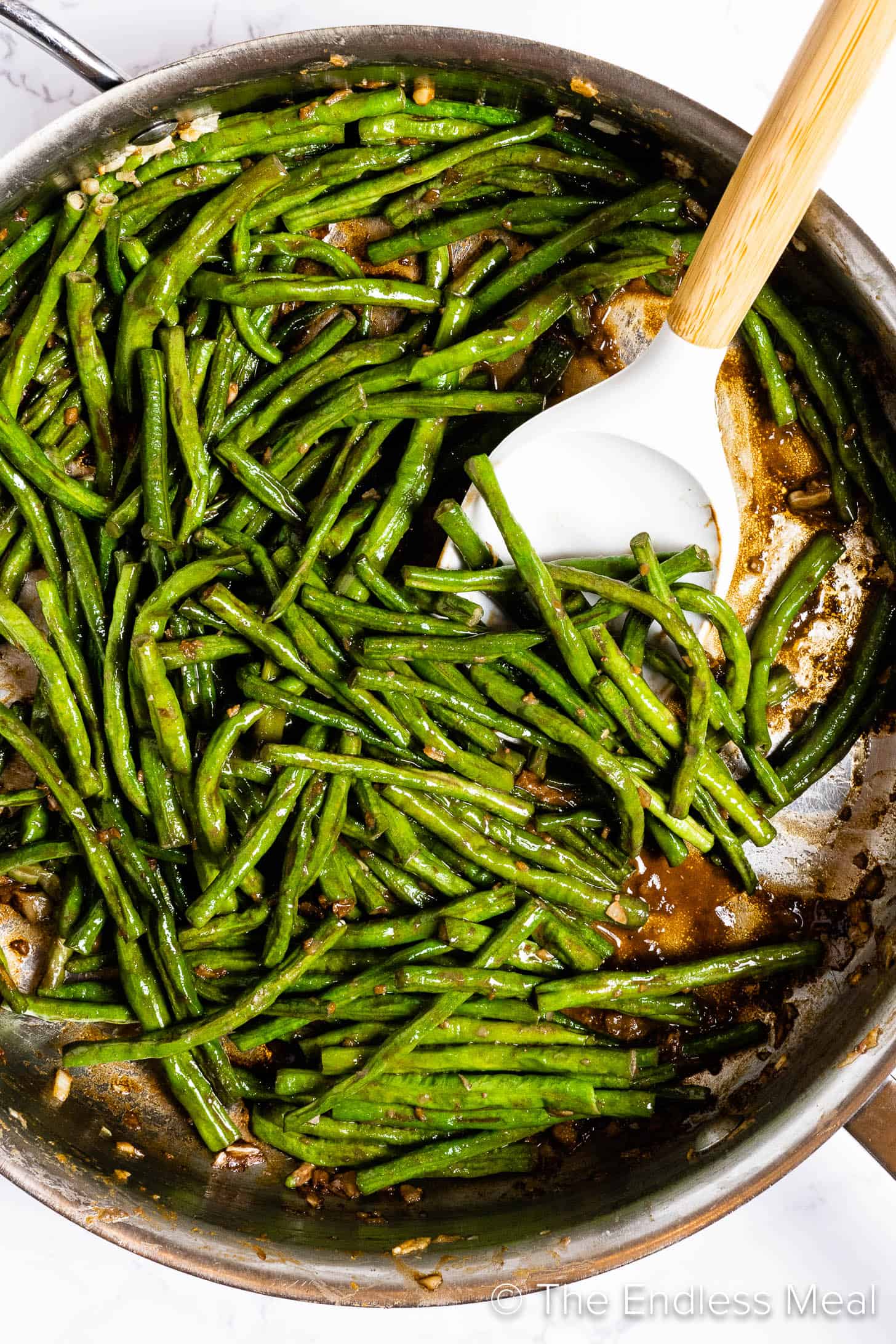 Making this recipe for long beans in a pan.