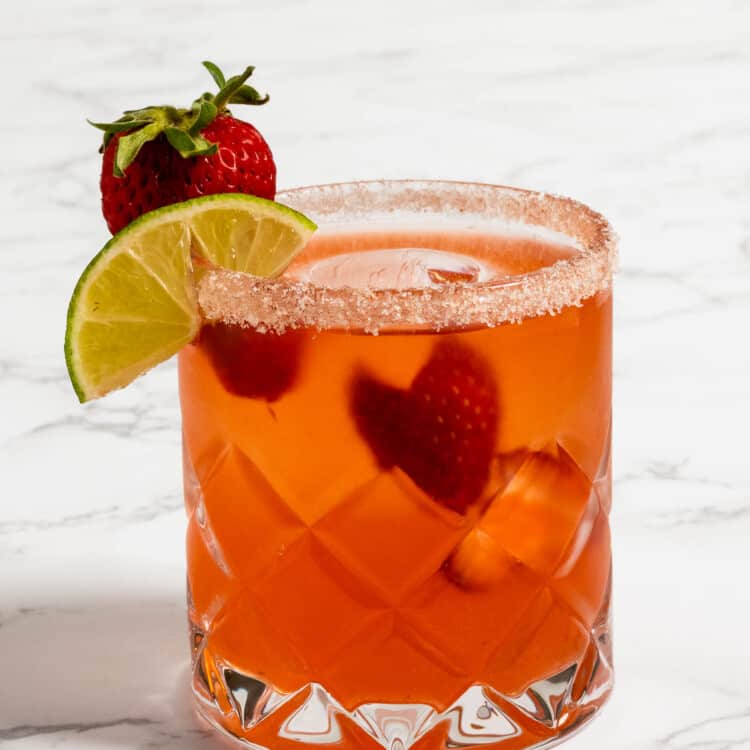 A Strawberry Margarita in a salt rimmed glass
