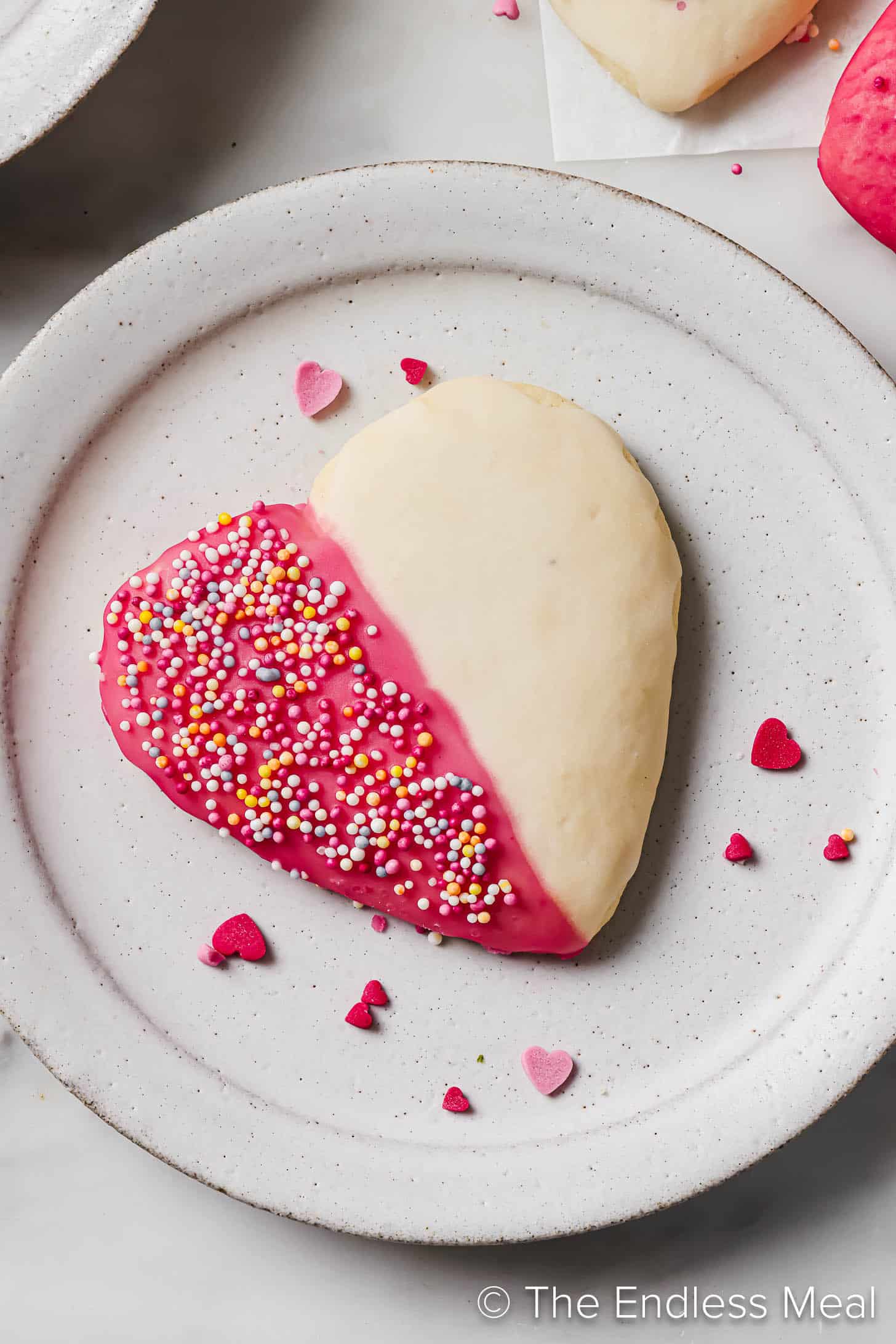 A Heart Shaped Cookie on a dessert plate