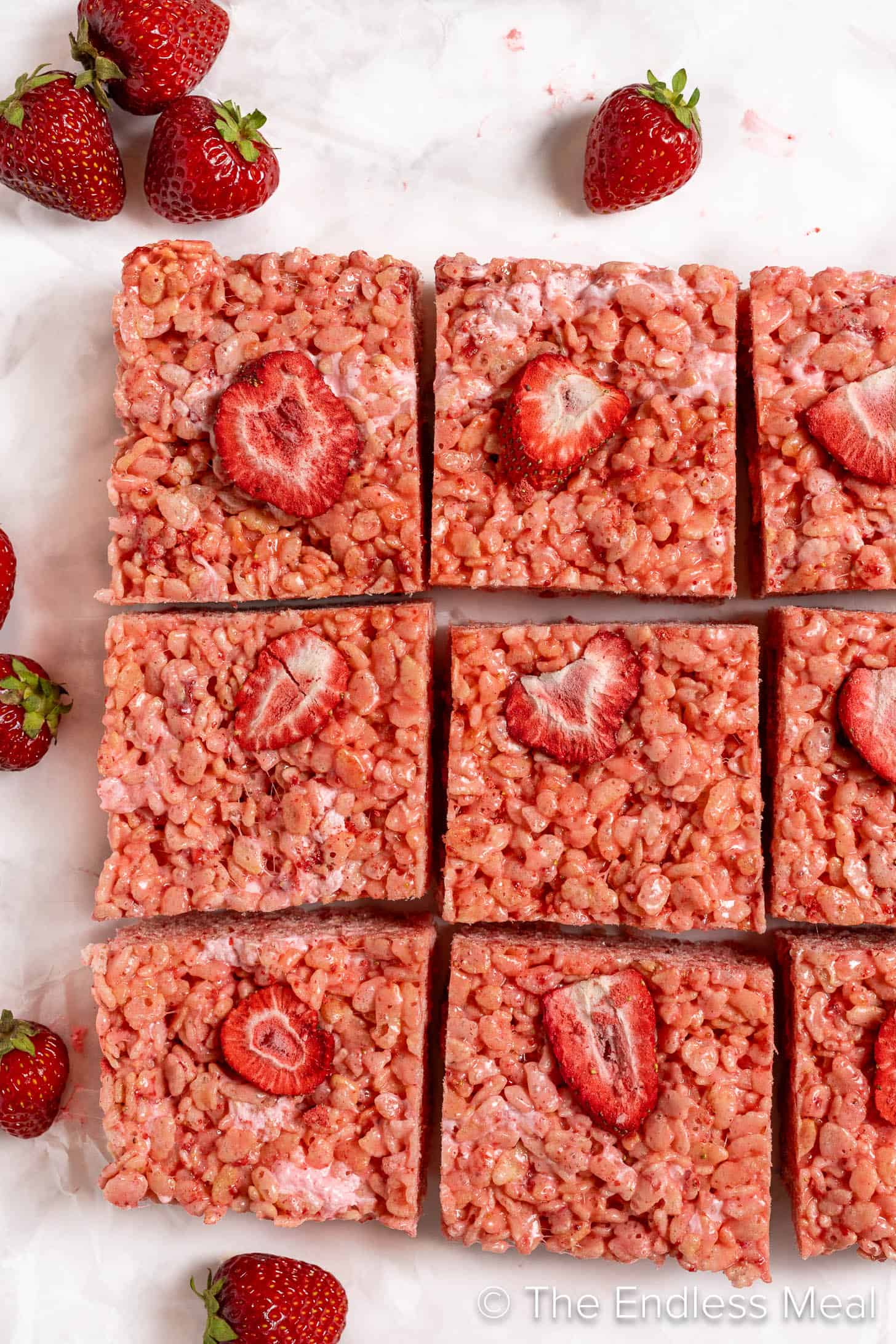 Strawberry Rice Krispie Squares topped with freeze dried strawberries
