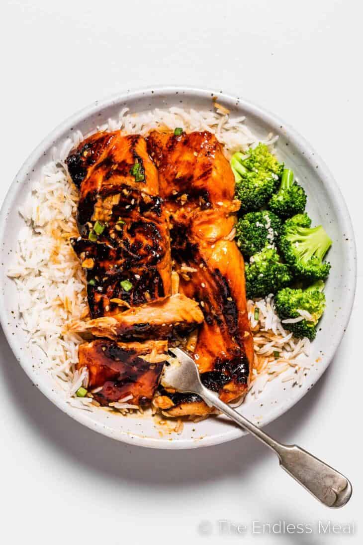 Firecracker Salmon on a plate with rice