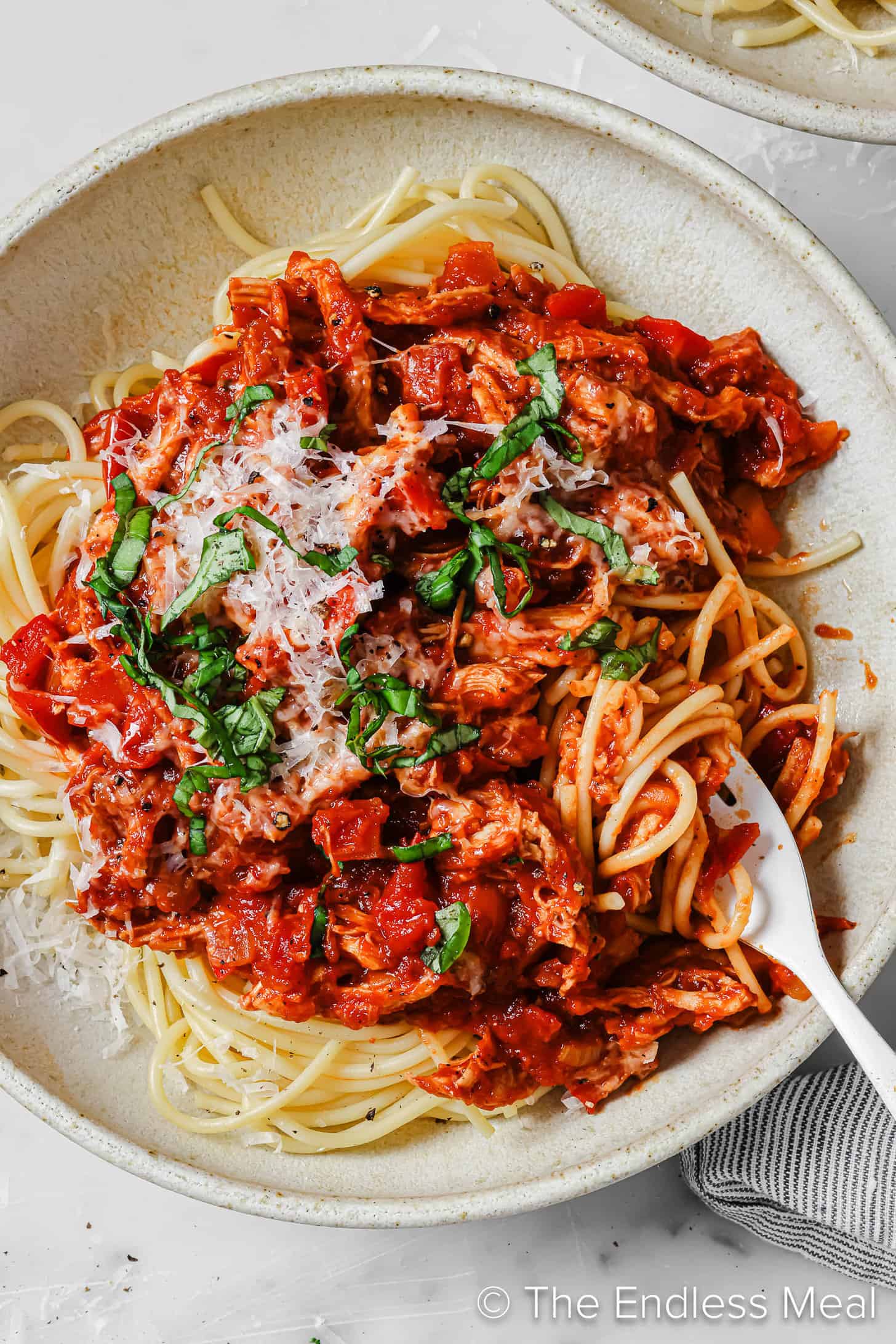a bowl of Leftover Turkey Bolognese with a fork