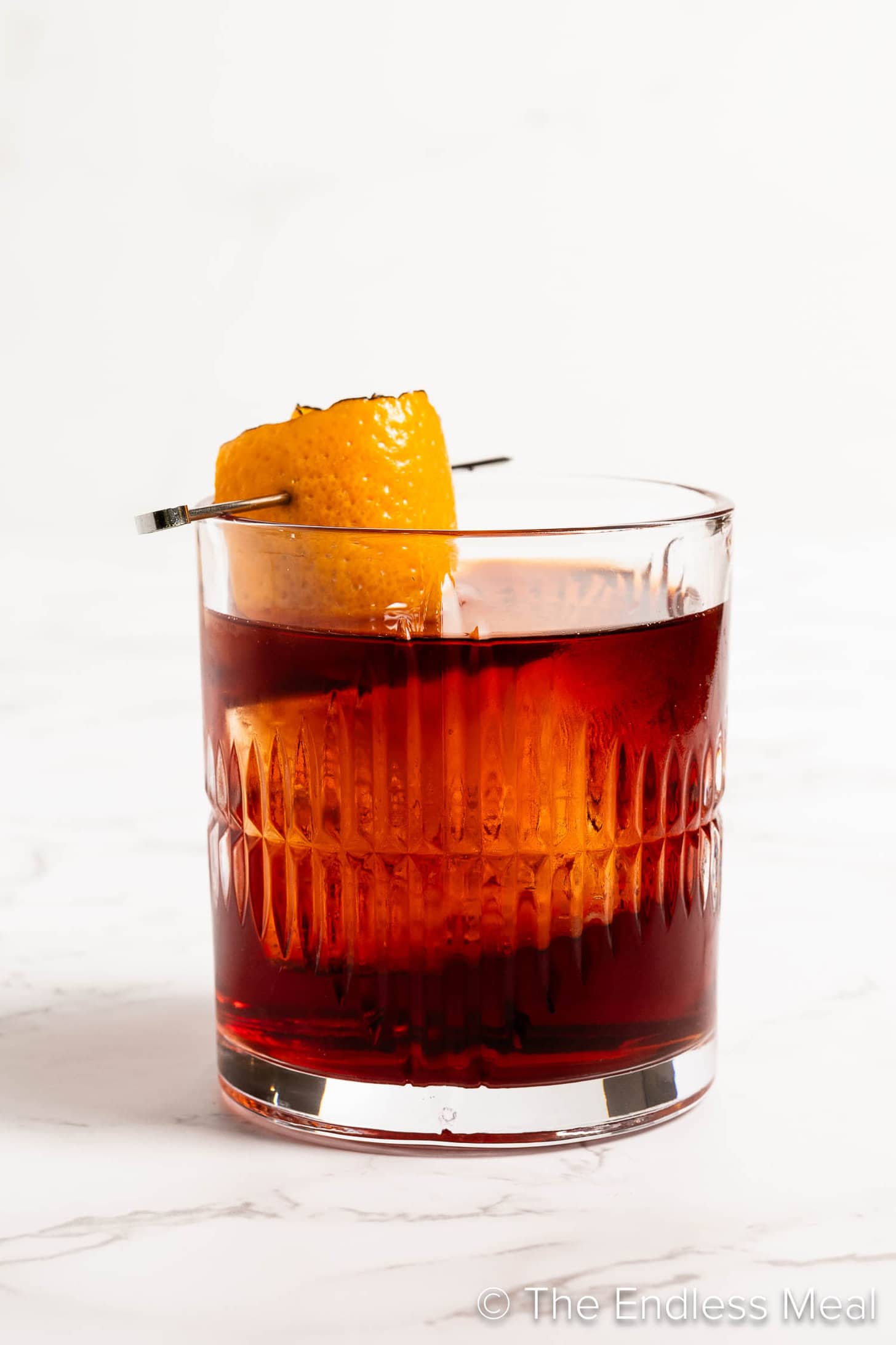 A Rum Negroni in a rocks glass.