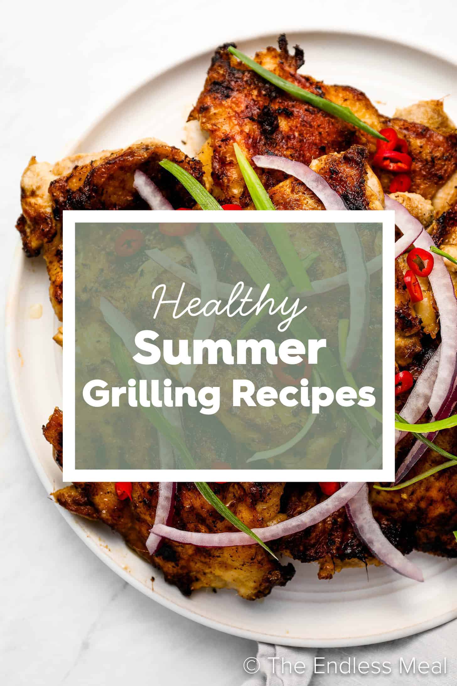 Grilled chicken on a plate with the words Healthy Summer Grilling Recipes on top. 