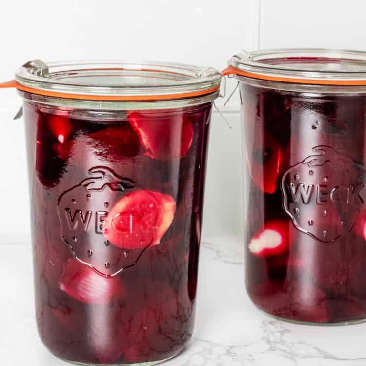 Canning jars filled with Pickled Beets and Onions