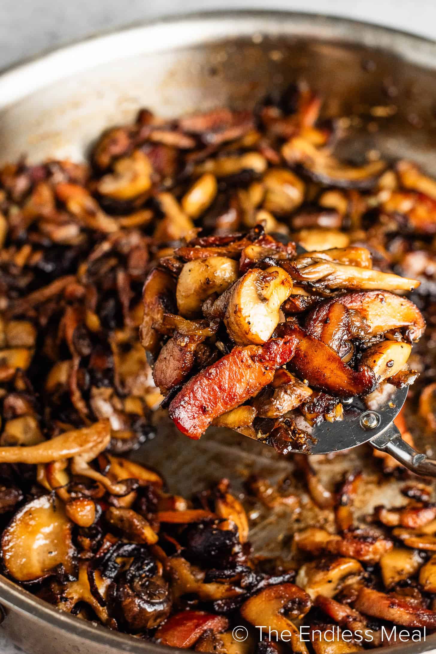 Cooking Bacon Mushrooms in a pan