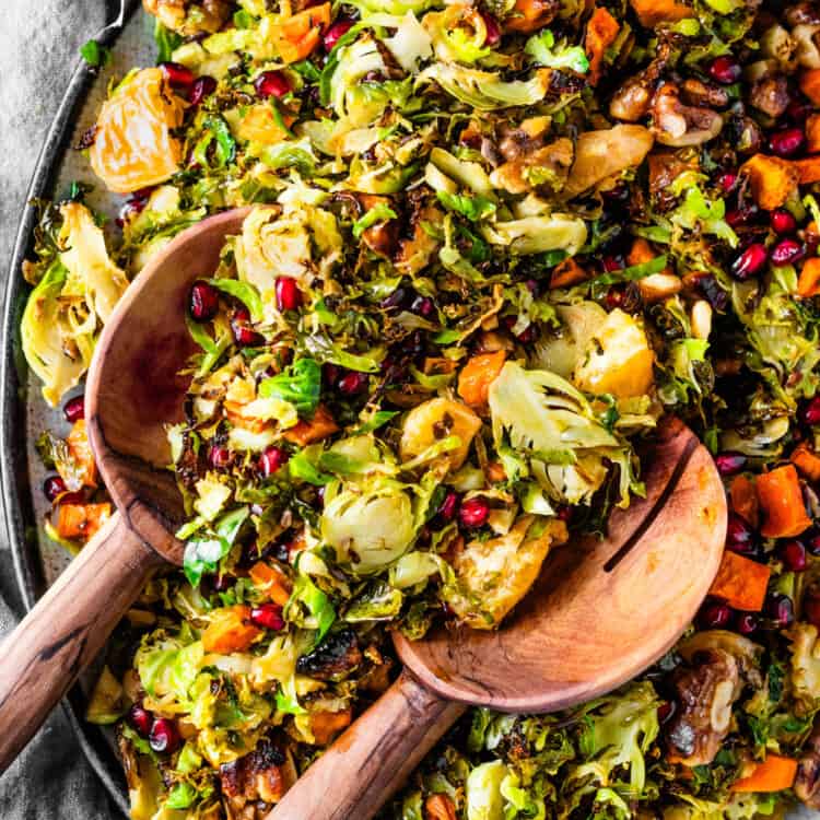 A Fall Brussels Sprouts Salad on a salad serving platter