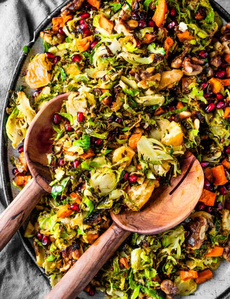 A Fall Brussels Sprouts Salad on a salad serving platter