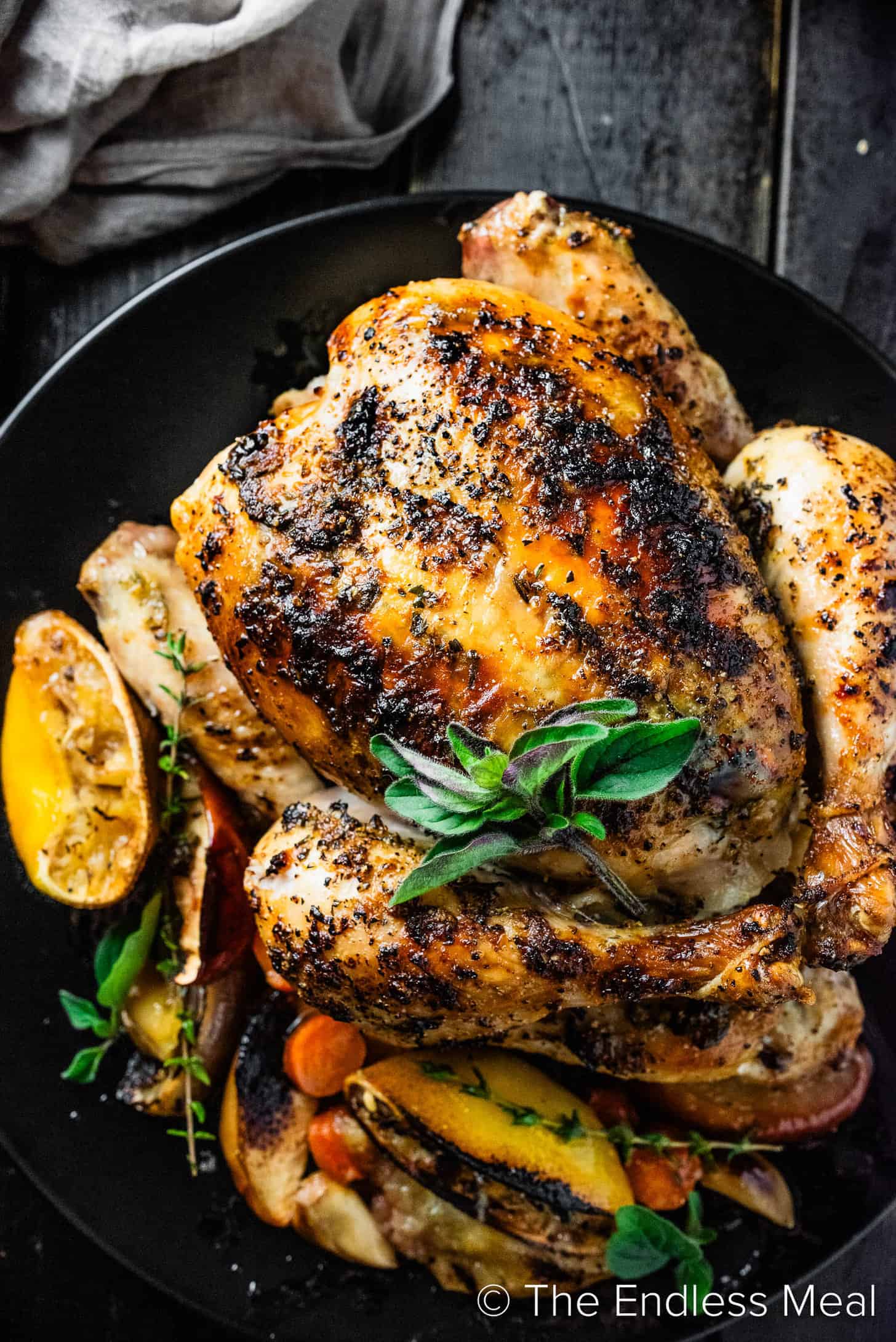 Lemon Butter Roasted Chicken on a serving tray